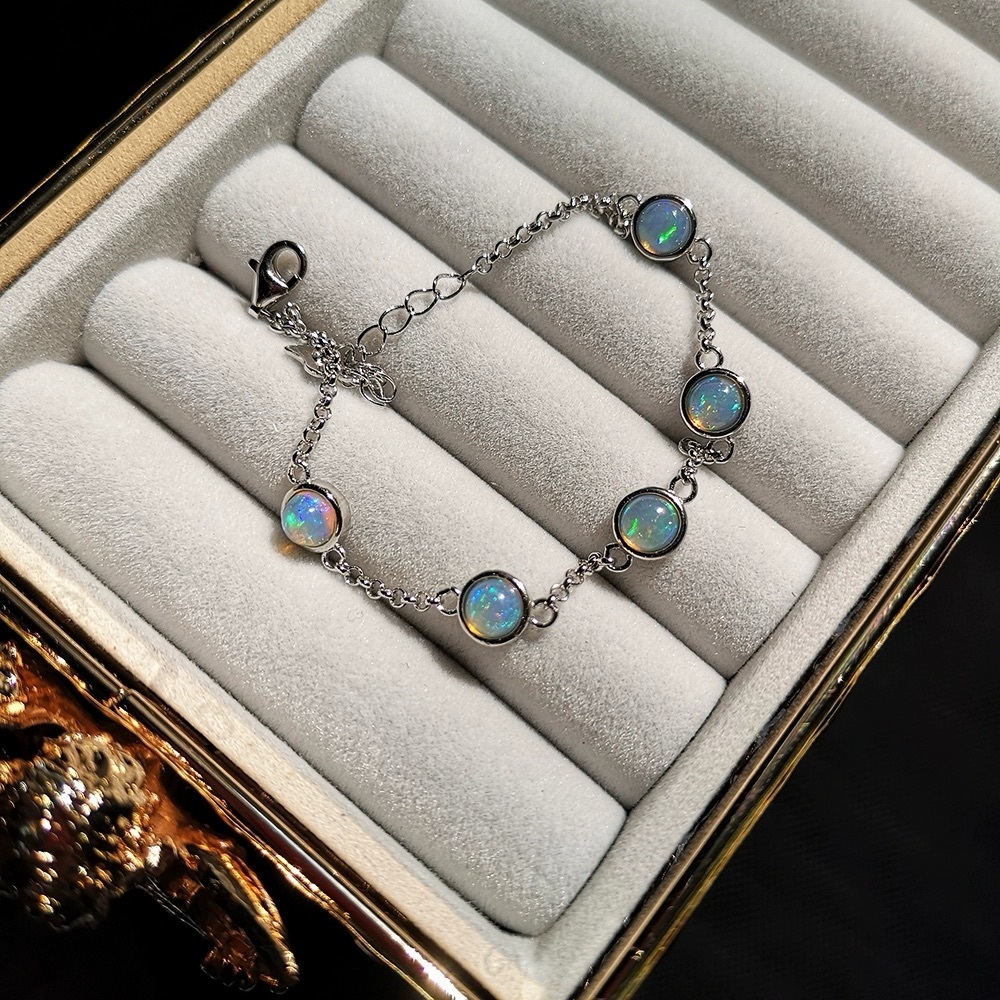 Elegant Silver Bracelet with Opal Accents